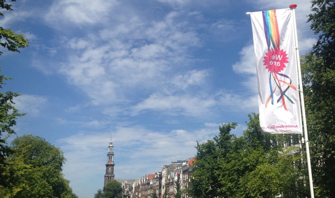 We are proud flag with Westertoren in the background