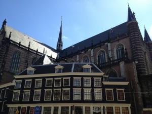 The back of the church with small houses 'stuck' to the church itself. The tiny tower of the church just sticks out in the middle