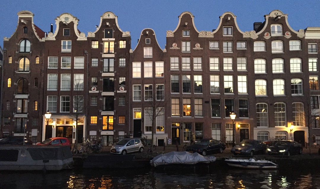 A row of typical Amsterdam canal houses along Prinsengracht