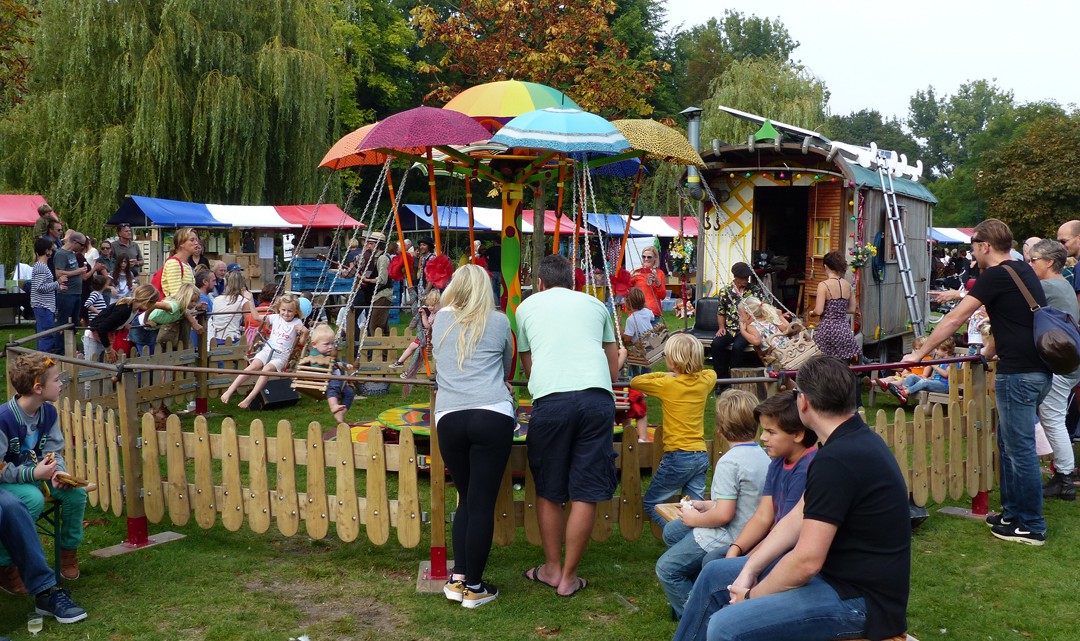 A small, colourful fun fair / playground for kids