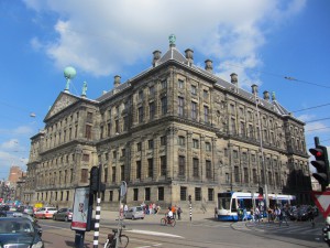 The Royal Palace as seen from the back with traffic and a tram in front of it