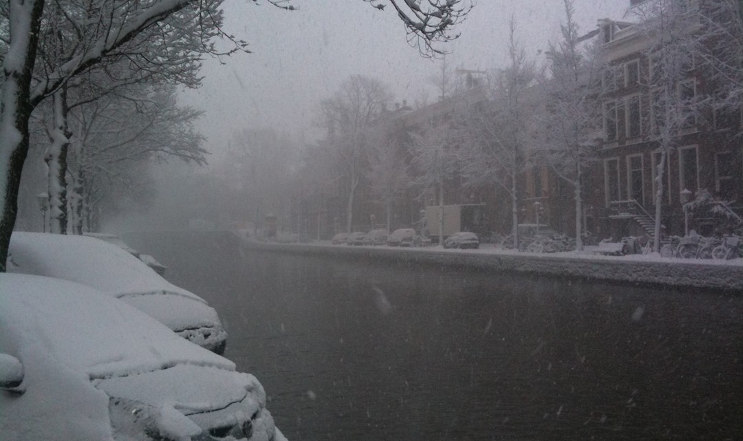 A snowy canal in Amsterdam