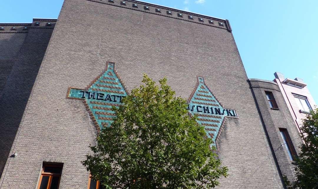 Tiled sign stating "Theater Tuschinksi"