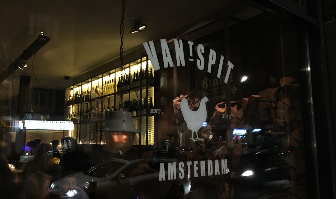 Logo on window by night