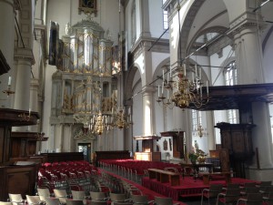 The organ and pulpit in the sober interior